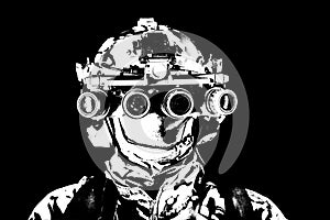 Soldier in night view goggles low key studio shoot