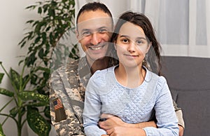 Soldier reunited with his daughter.