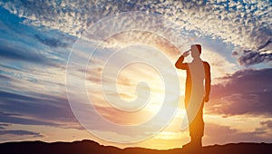 Soldier saluting at sunset. Army, salute, patriotic concept