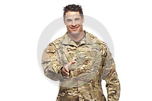 Soldier smiling and ready to shake hands
