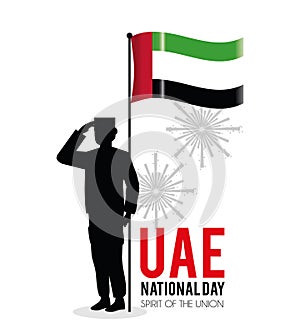 Soldier with uae flag to celebrate national day