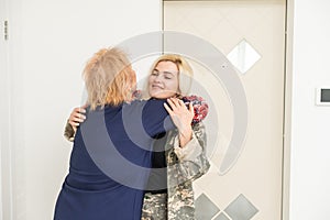 Soldier woman reunited with her mother