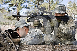 Soldiers Aiming Machine Gun photo