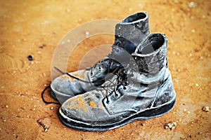 Soldiers boots of the army of Israel in dust on the sand photo