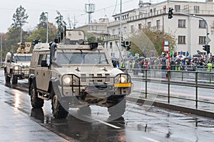 Soldiers of Czech Army are riding light multirole vehicle  on military parade in Prague, Czech Republic