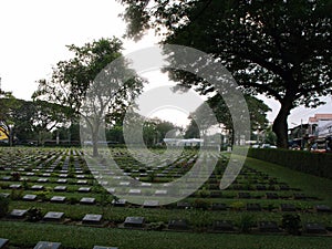 Soldiers graves at World War II Army Fighters Military Cemetery in Kanchanaburi, Thailand