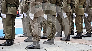 Soldiers lined up in the city square before performing the ceremony - The Army soldiers standing in row they are wearing and wear