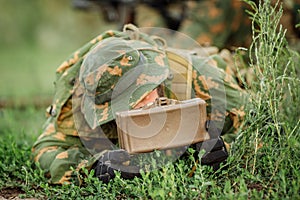 Soldiers set mine in the grass