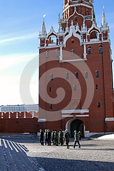 Soldiers walk in Moscow Kremlin. UNESCO World Heritage Site.