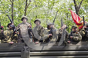 Solemn procession of the militarized column of military equipment on parade in honor of the 69th anniversary of the Great Victory