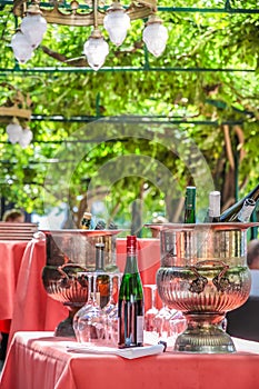 Solemnly laid table with wine glasses