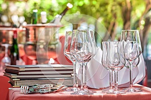 Solemnly laid table with wine glasses
