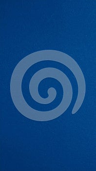 Solid blue background texture for abstract design and artistic projects