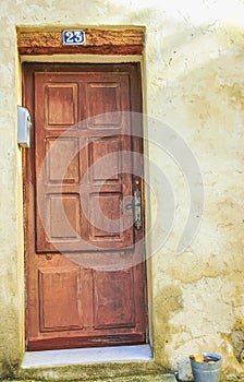 Solid, brown, wood, eight panel, 1500s front door, Sablet, France photo