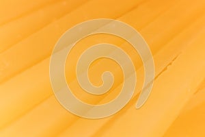 Solid cheese slices. Background Texture