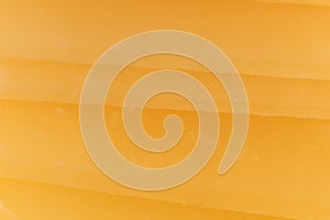 Solid cheese slices. Background Texture