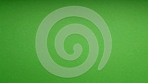 Solid green background texture for design and visual media