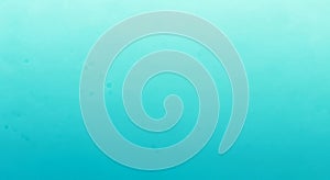 Solid light blue gradient background with subtle texture variations. The monochromatic design