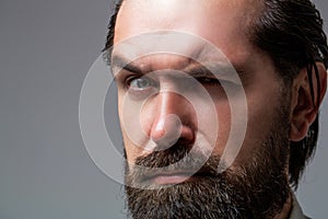 Solid man with beard and mustache. Closeup portrait of athletic bearded man. Handsome stylish bearded man. Sexy male