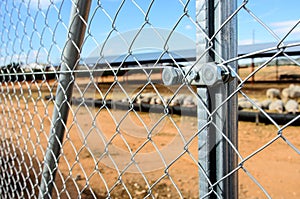 Solid metallic mesh fence closeup