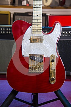 Solid red Telecaster style electric guitar