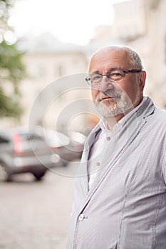 Solid smiling man in the city