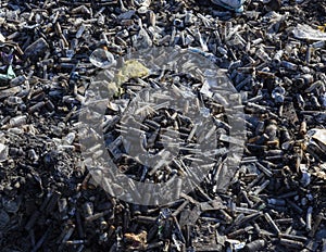 Solid waste dumping site with test tubes and lab wastage