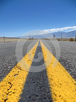 Solid Yellow Lines on Lonely Desert Highway