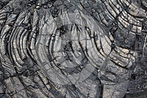 Solidified black lava rock
