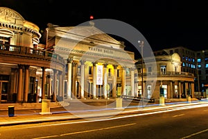 Solis Theater at night with traffic lights in Montevideo old tow