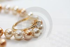 Solitaire diamond ring on pearls