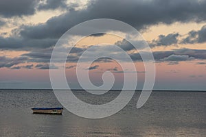 Solitary boat dawn seascape