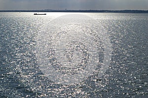 Solitary boat on ocean