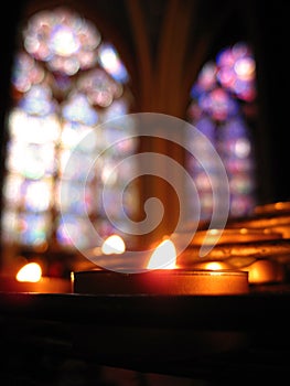 Solitary Candle & Stained Glass - Notre Dame