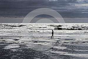 A Solitary Man on the Beach.