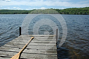 Solitude - cedar dock on a small calm lake
