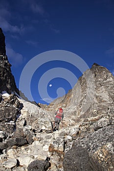 Solitude lady trekking in Himalayas region