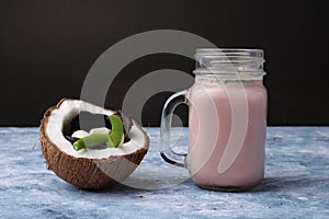 Solkadhi OR Kokum curry, served in a glass.