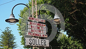 Soller, Mallorca, Spain. Group of welcome signs in Soller in different languages