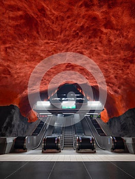 Solna station, Stockholm, Sweden. A popular metro station in the Swedish capital. Escalator in the underground. photo