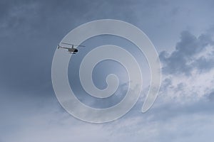 Solo Helicopter in Cloudy Sky