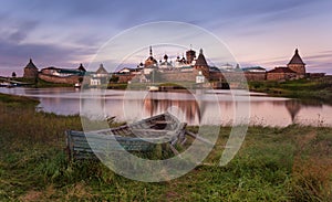 Solovki Island, Russia. Classic Scenic View Of The Solovetsky Spaso-Preobrazhensky Transfiguration Monastery And The Big Old Boat