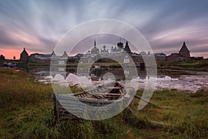 Solovki Island, Russia. Classic Scenic View Of The Solovetsky Spaso-Preobrazhensky Transfiguration Monastery And The Big Old Boat