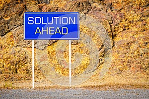 Solution ahead sign showing business concept.