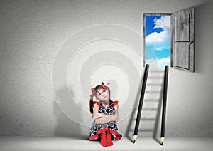 Solution concept, child girl dreaming near stairs of pencils