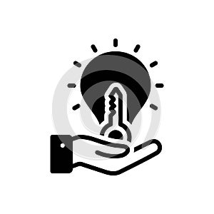 Black solid icon for Solution, key and light