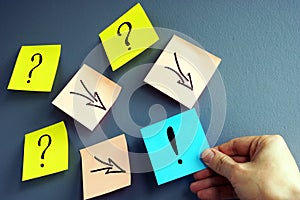 Solving of problem. Answer concept. Question marks and arrows to the exclamation mark.