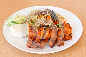 Som tum Thai papaya salad with barbecue chicken