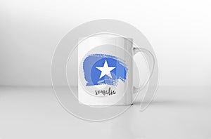 Somalia flag on white coffee mug.