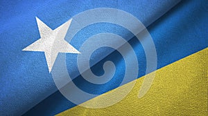 Somalia and Ukraine two flags textile cloth, fabric texture